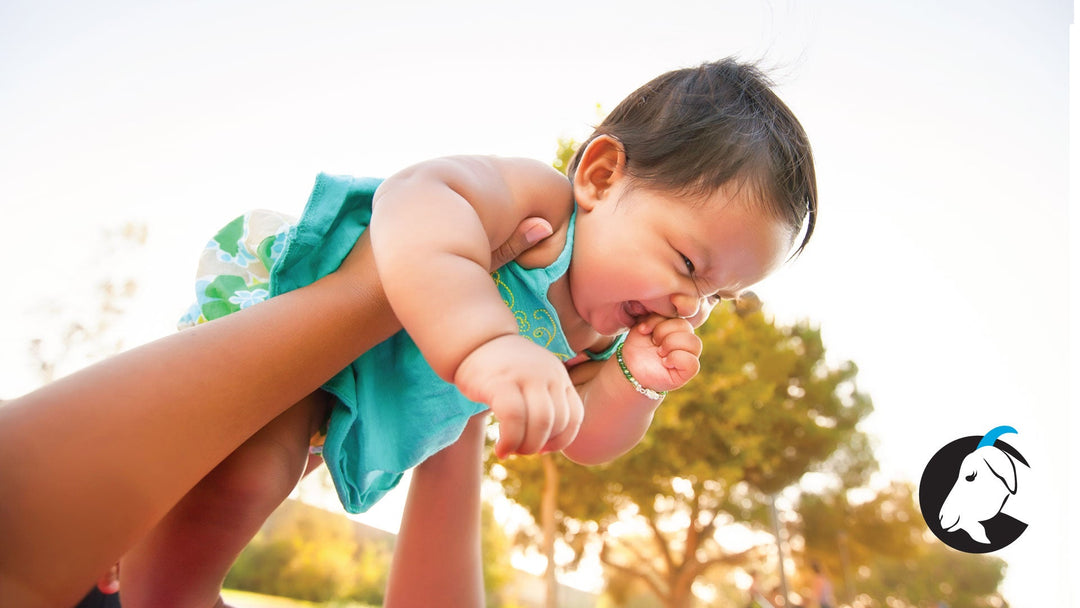 Baby and parent playing
